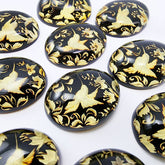 Cherry Amber Engraved Hummingbird Oval Shape Cabochon