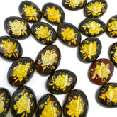 Cherry Amber Engraved Roses Oval Shape Cabochon