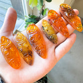 Cognac Amber Carved Roses And Skull Cabochons