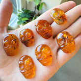 Cognac Amber Carved Skull Cabochons
