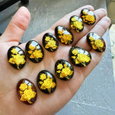 Cherry Amber Engraved Flower Oval Shape Cabochon