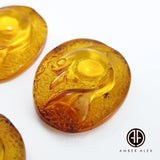 Cognac Amber Carved Fish Cabochon
