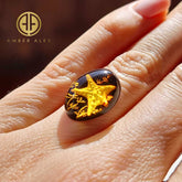 Cherry Amber Engraved Starfish Oval Shape Cabochon