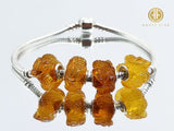 Cognac Amber Carved Snakes Charm Bead