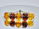 Multi-Color Amber Carved Pig Charm Bead