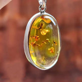 Natural Amber Free Shape Pendant Sterling Silver With Insect