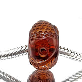 Multi-Color Amber Carved Fish Charm Bead