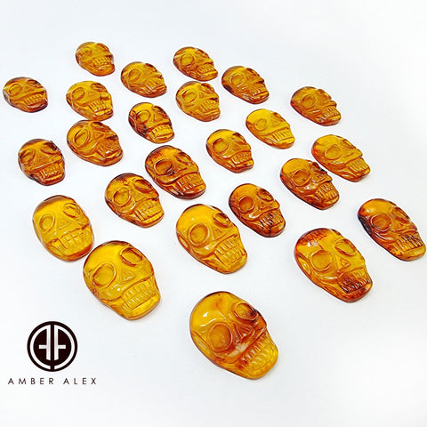 Cognac Amber Carved Skull Cabochons