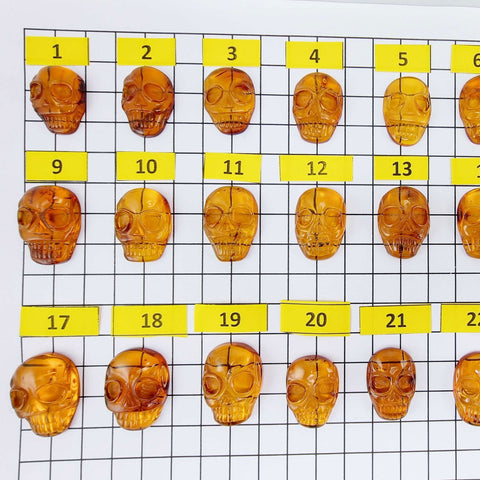 Cognac Amber Carved Skull Cabochons