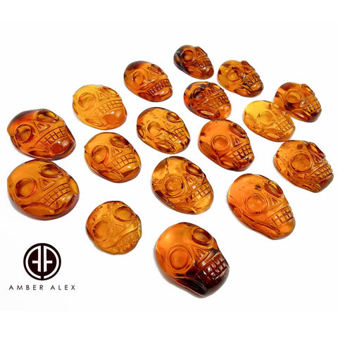 Cognac Amber Carved Skull Cabochons