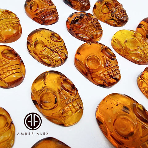 Cognac Amber Carved Skull Cabochons