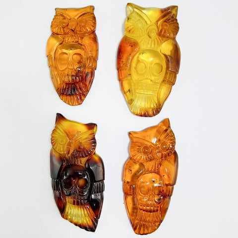 Cognac Amber Carved Owl with Skull Cabochons