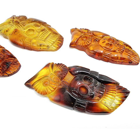 Cognac Amber Carved Owl with Skull Cabochons