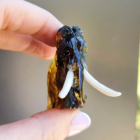 Fossil Amber Carved Mammoth Figurine