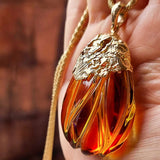 Carved Amber Drop Shape Pendant 14k Gold Plated