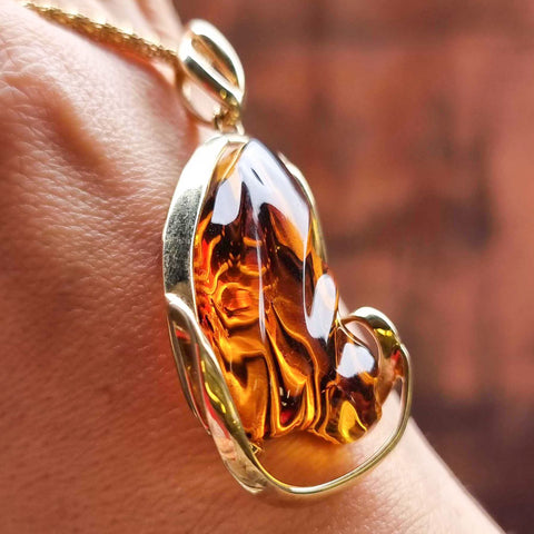 Carved Amber Free Shape Pendant 14k Gold Plated