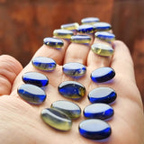 Blue Amber Oval Shape Calibrated Cabochons