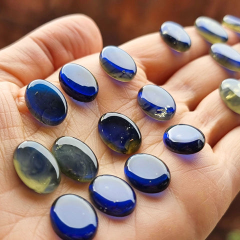 Blue Amber Oval Shape Calibrated Cabochons