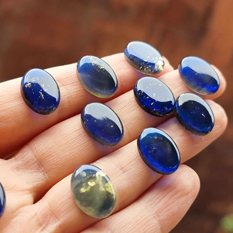 Blue Amber Oval Shape Calibrated Cabochons