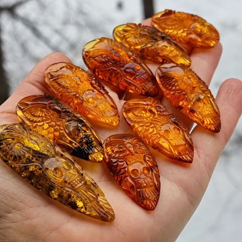 Cognac Amber Carved Owl with Skull Cabochons