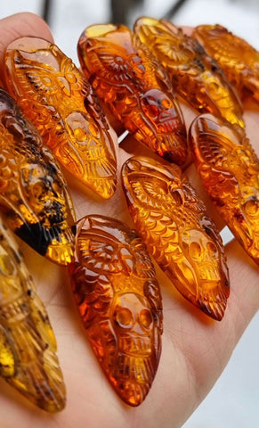 Cognac Amber Carved Owl with Skull Cabochons