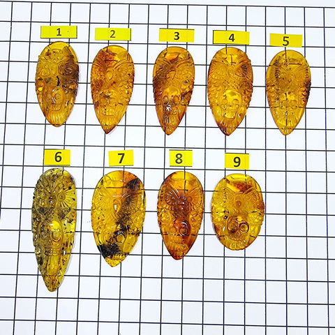 Cognac Amber Carved Owl with Skull Cabochons
