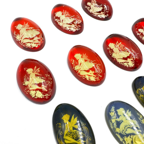 Red & Blue Amber Engraved Fairies Oval Shape Cabochons