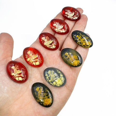 Red & Blue Amber Engraved Fairies Oval Shape Cabochons
