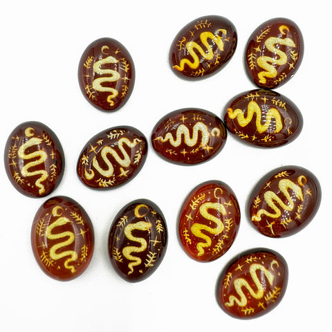 Cherry Amber Engraved Snakes Oval Shape Cabochon