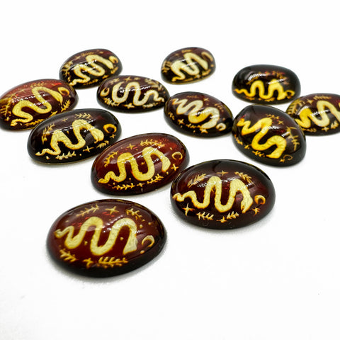 Cherry Amber Engraved Snakes Oval Shape Cabochon