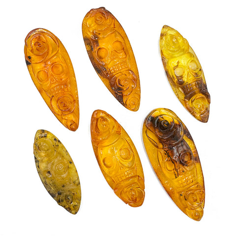 Cognac Amber Carved Roses And Skull Cabochons