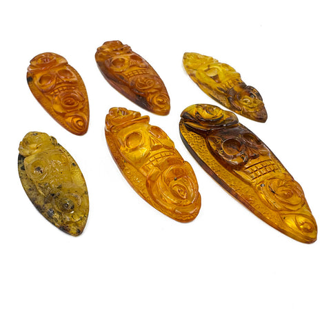 Cognac Amber Carved Roses And Skull Cabochons