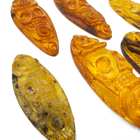 Cognac Amber Carved Roses And Skull Cabochons