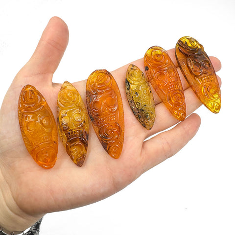 Cognac Amber Carved Roses And Skull Cabochons