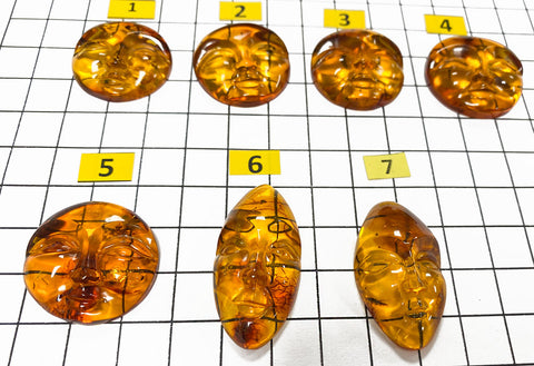 Cognac Amber Carved Faces Cabochons