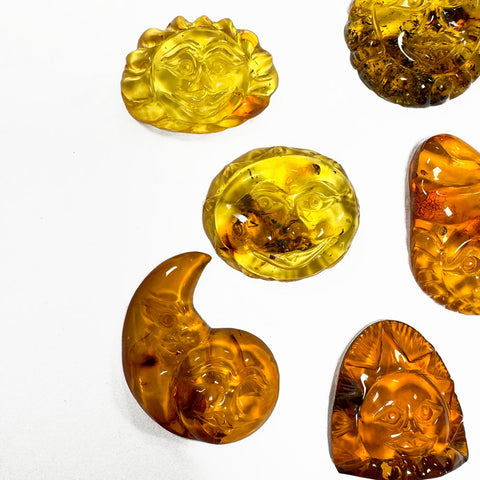 Cognac Amber Carved Sun Cabochon