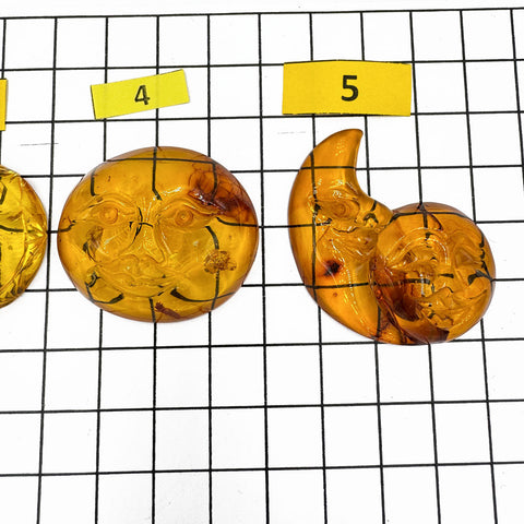 Cognac Amber Carved Sun Cabochon