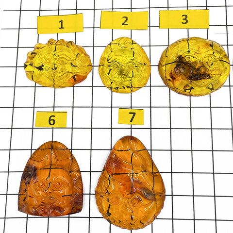 Cognac Amber Carved Sun Cabochon