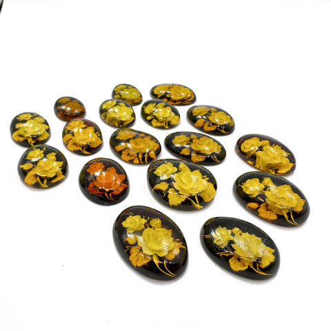 Cherry Amber Engraved Flower Oval Shape Cabochon