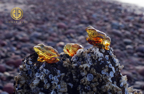 Cognac Amber Carved Frogs Figurines