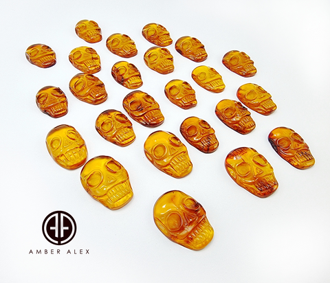 Cognac Amber Carved Skull Cabochons