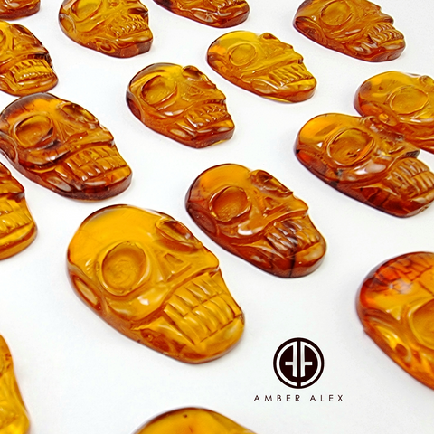 Cognac Amber Carved Skull Cabochons