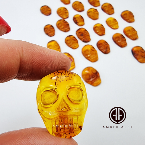 Cognac Amber Carved Skull Cabochons