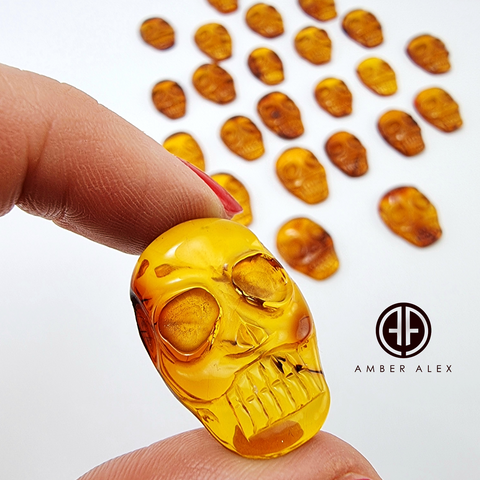 Cognac Amber Carved Skull Cabochons