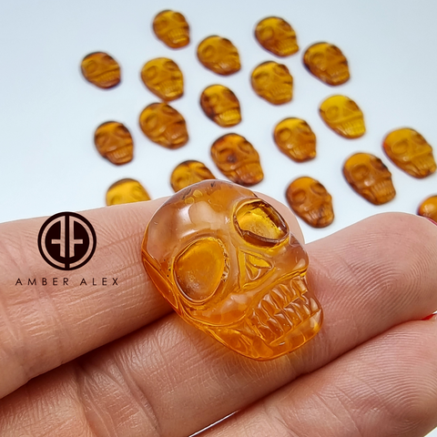 Cognac Amber Carved Skull Cabochons