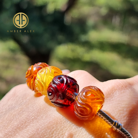 Multi-Color Amber Carved Leaf Charm Bead