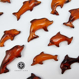 Cognac Amber  Carved Dolphin Cabochons