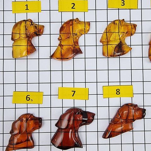 Cognac Amber Carved Dogs Cabochon