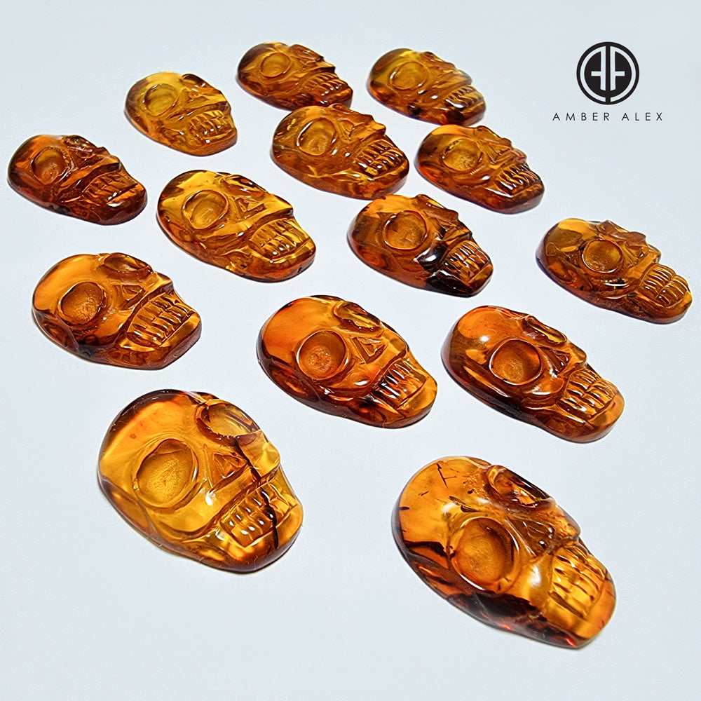 Cognac Amber Carved Skull Cabochons
