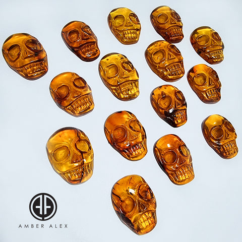 Cognac Amber Carved Skull Cabochons